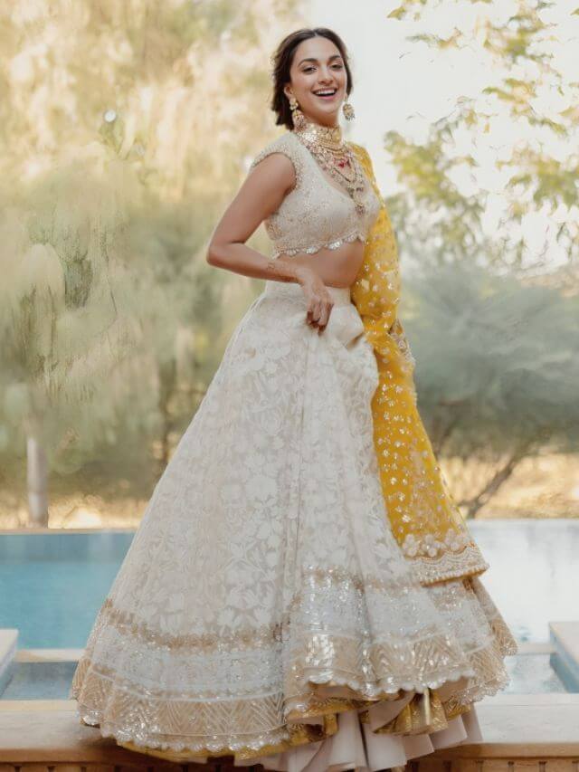 Kiara Advani’s Ivory and Yellow Colored Chikan Lehenga